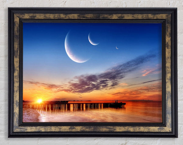 Three Moons Framed Print