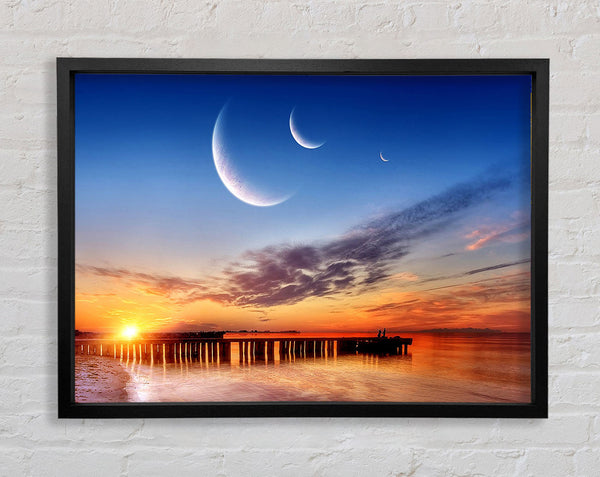 Three Moons Framed Print