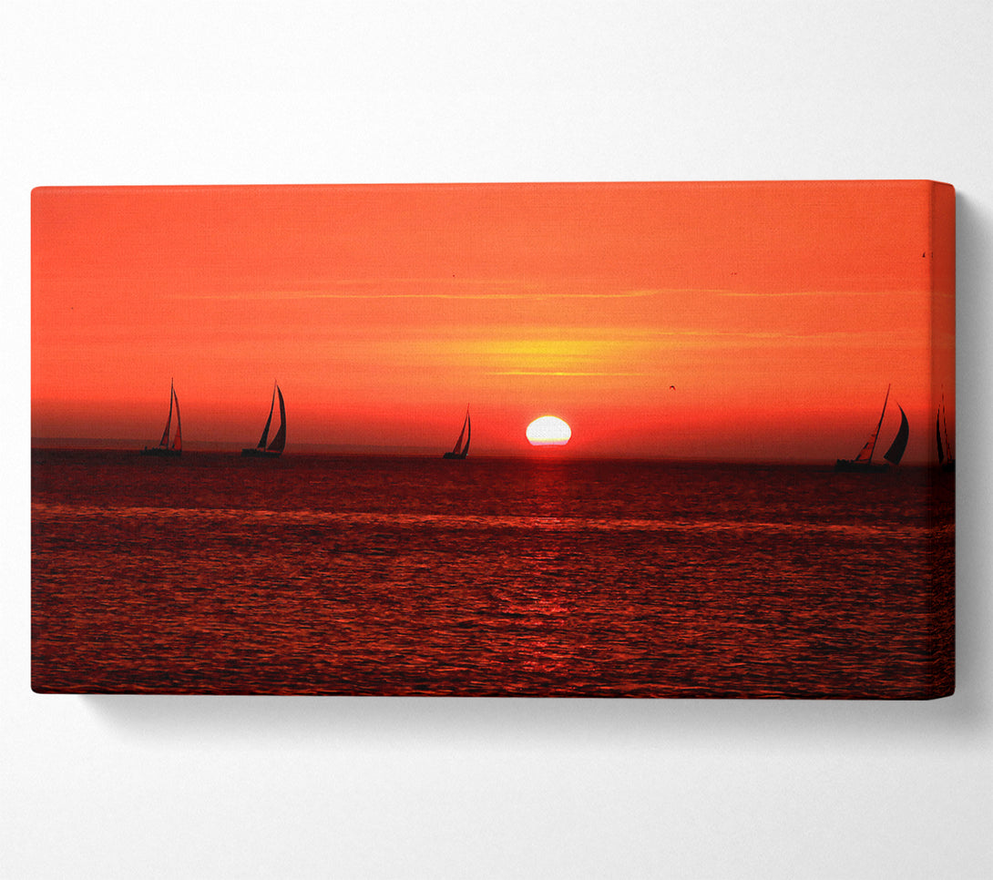  A Canvas Print of Sunset Boats In The Ocean Canvas Print