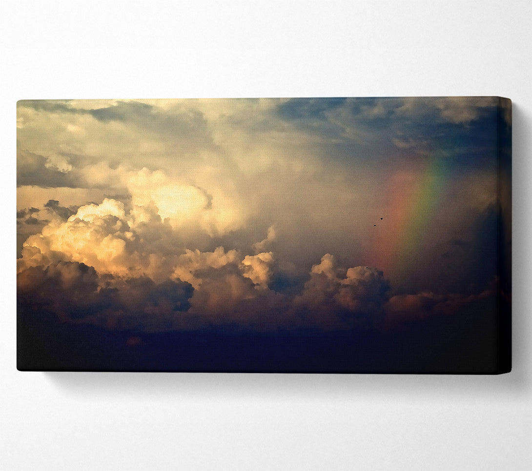  A Canvas Print of Storm Clouds And Rainbow Canvas Print