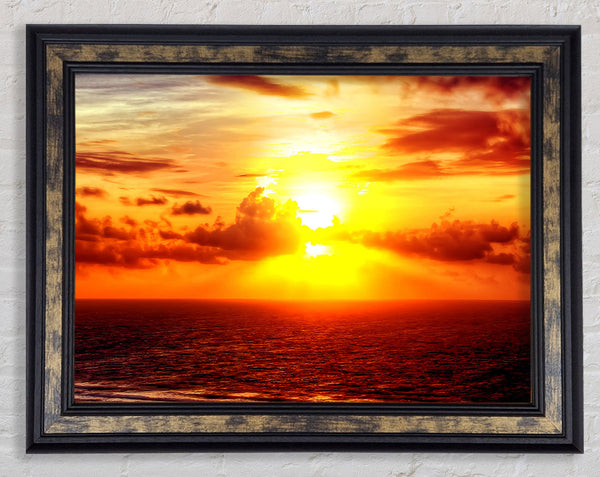 Sunrise Across The Sea Framed Print