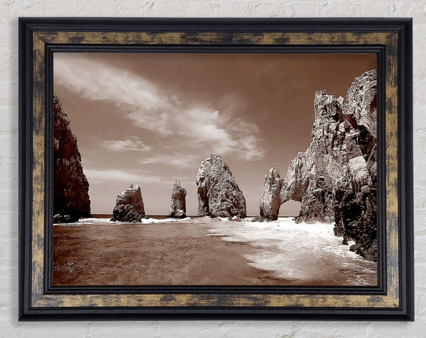 Brown Rocks In The Ocean Framed Print