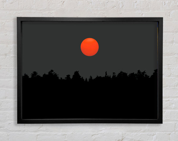 The Red Sun Over The Grey Treeline Framed Print