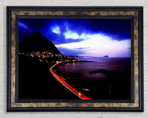 The Road Past The Ocean Framed Print