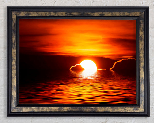 The Sun Falls In The Ocean Framed Print