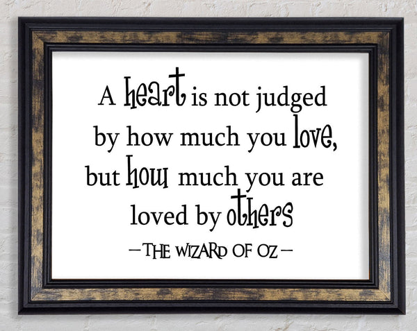 Movie Quote Wizard Of Oz A Heart Is Not Judged Framed Print