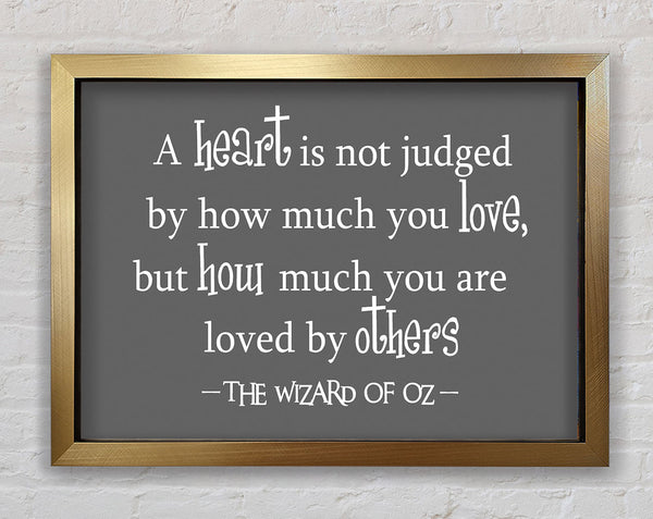 Movie Quote Wizard Of Oz A Heart Is Not Judged Grey Framed Print