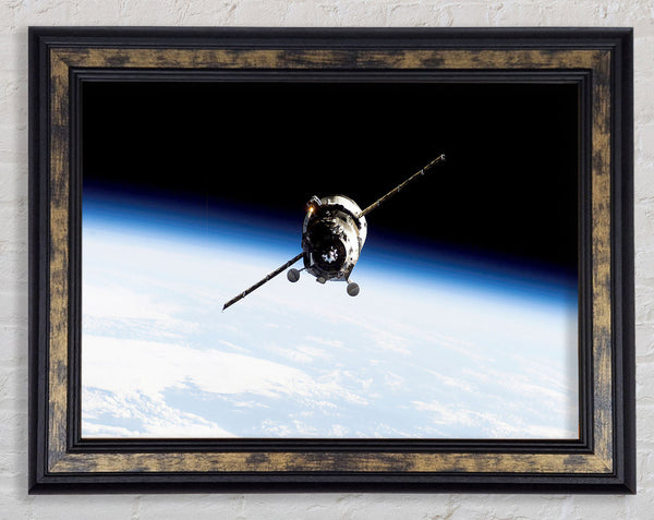 Orbiting The Earth Framed Print