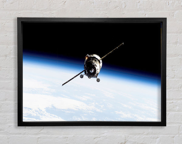 Orbiting The Earth Framed Print