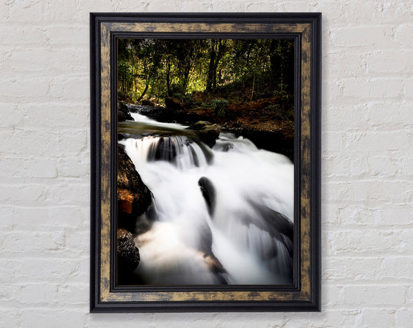 The Woodland Waterfall Framed Print