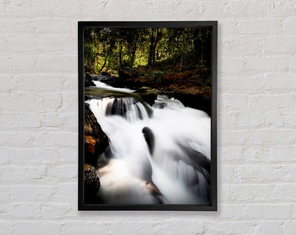 The Woodland Waterfall Framed Print