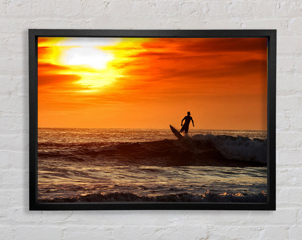 Sunset Surfing Framed Print