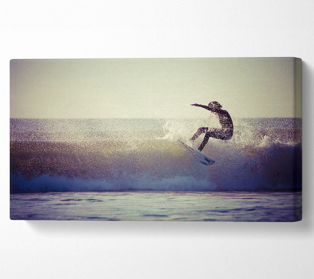  A Canvas Print of Surfing The Waves Canvas Print