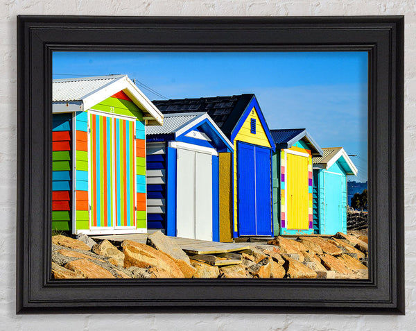 Beach Hut Rocks Framed Print