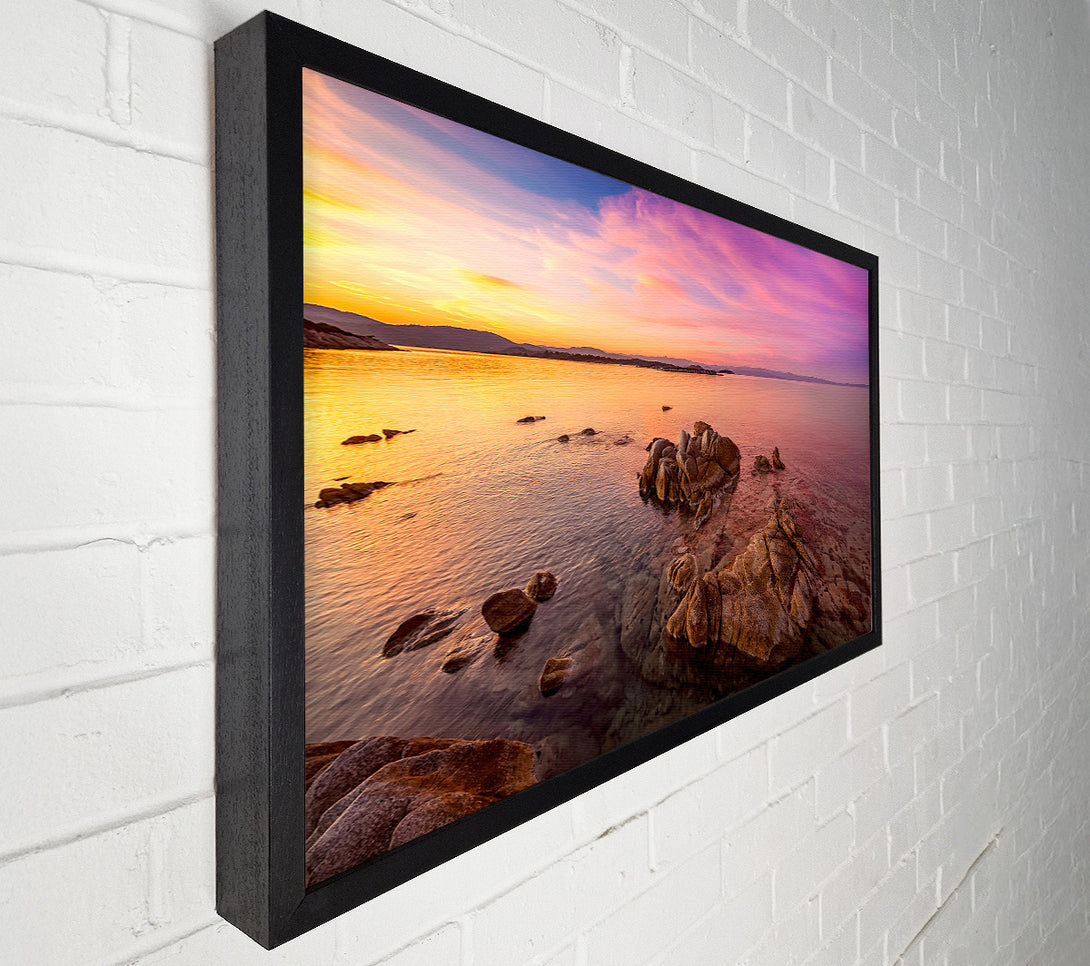  A Canvas Print of Pink Skies Over The Ocean Rocks Canvas Print