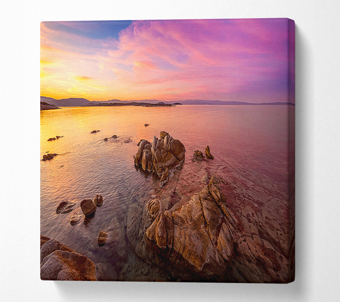 A Canvas Print of Pink Skies Over The Ocean Rocks Canvas Print