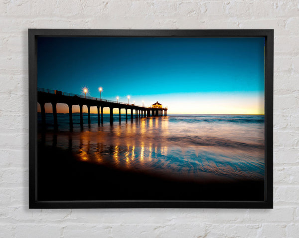 Pier Light Glow Framed Print