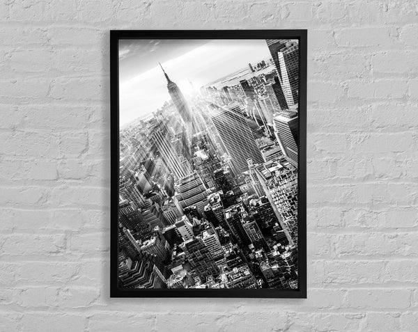 Sun Beams Through The Empire State Building Framed Print