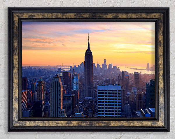 Sunset Over The Empire State Building Framed Print