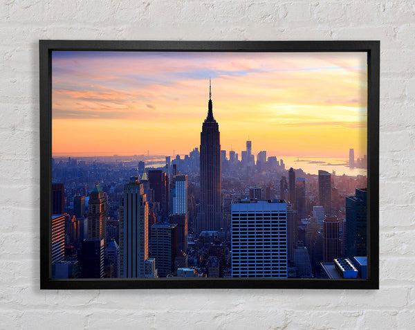 Sunset Over The Empire State Building Framed Print