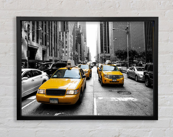 Yellow Cabs On The Inner City Steets Framed Print