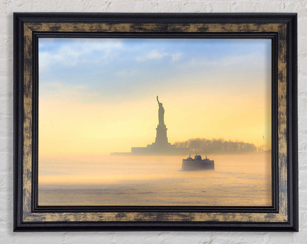 Mist Over The Statue Of Liberty Framed Print