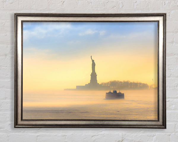 Mist Over The Statue Of Liberty Framed Print