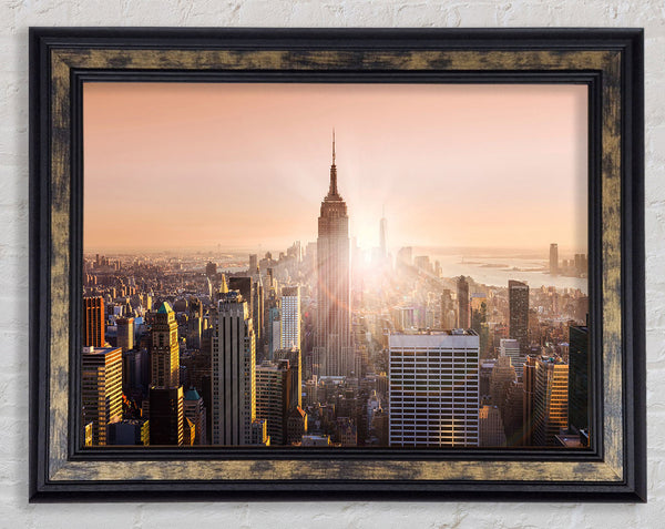 Sun Sparkle Through The Empire State Building Framed Print