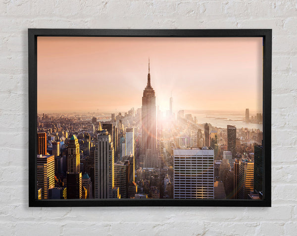 Sun Sparkle Through The Empire State Building Framed Print