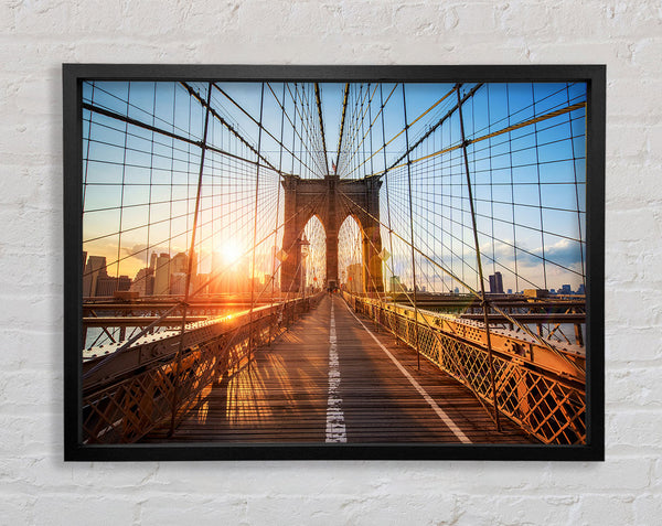 Sunset Through Brooklyn Bridge Framed Print