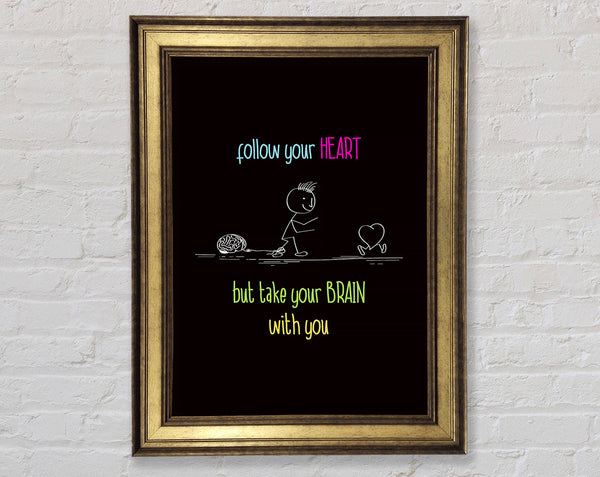 Follow Your Heart But Take Your Brain Framed Print