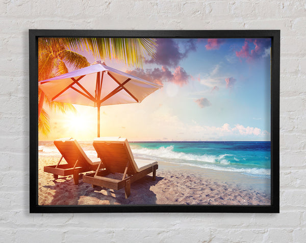 Sun chairs by the sea Framed Print