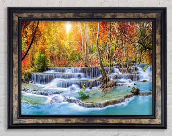 Waterfall forest sunset Framed Print