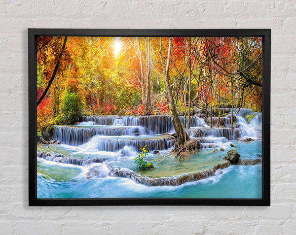 Waterfall forest sunset Framed Print
