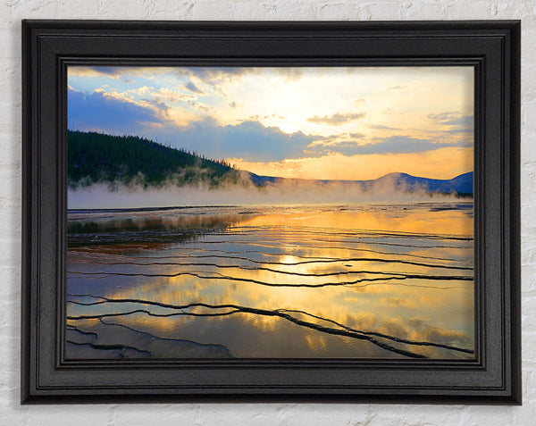 Frozen lake sunset Framed Print