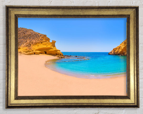 Beach cove blue seas Framed Print