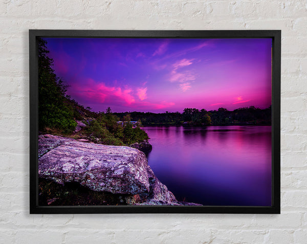 purple and blue lake off the cliffs Framed Print