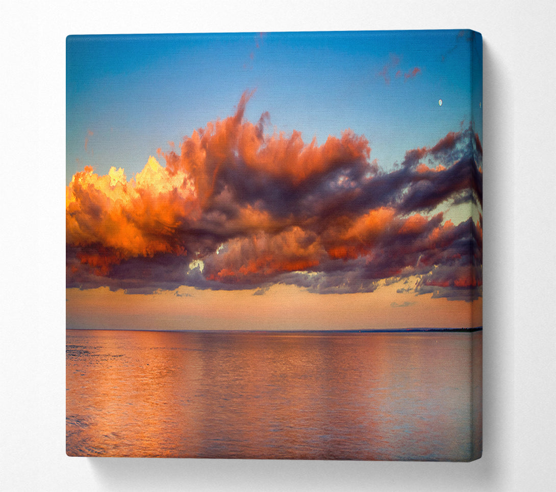  A Canvas Print of Red glowing clouds above the sea Canvas Print