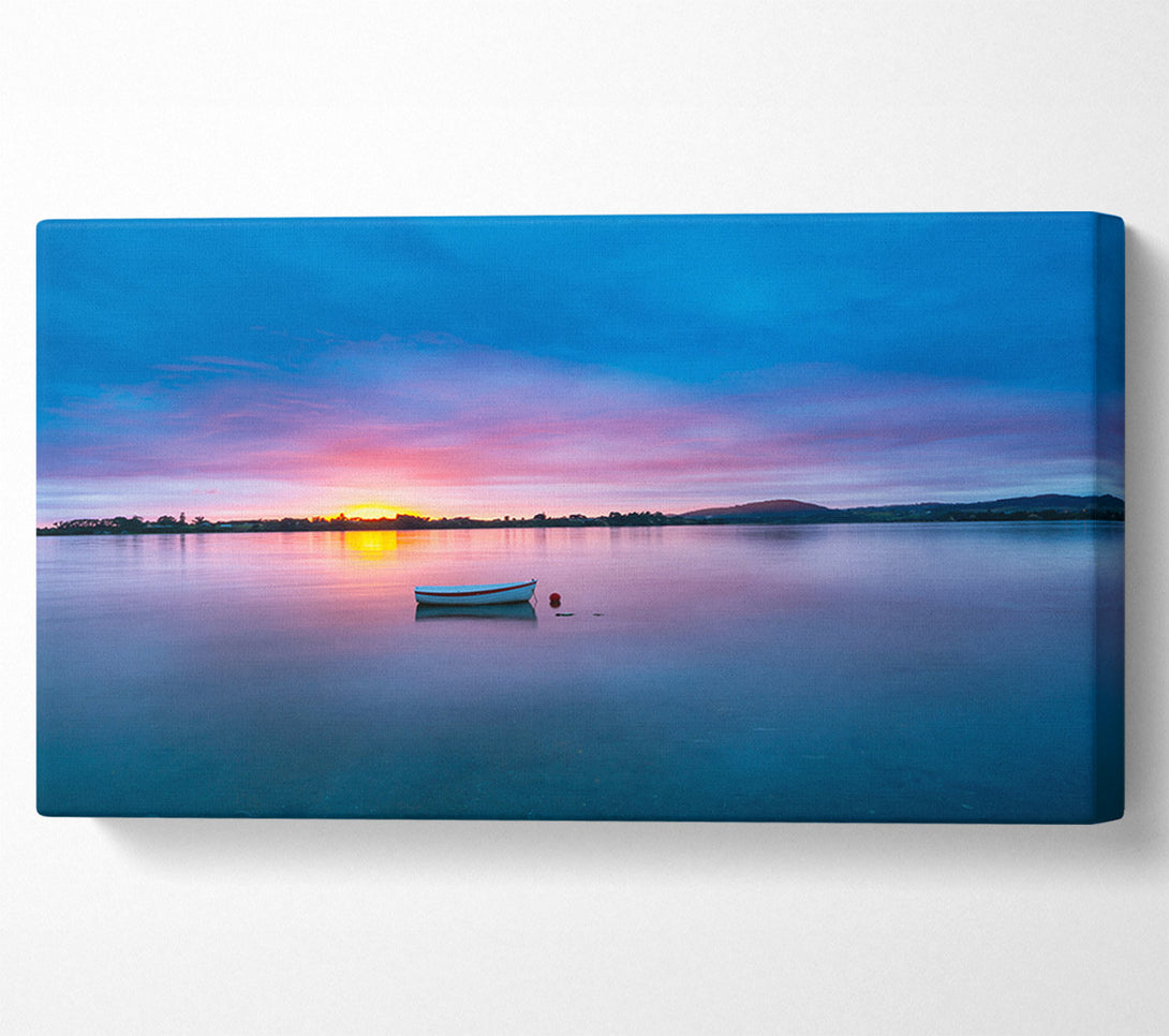  A Canvas Print of Small row boat on calm lake Canvas Wall Art