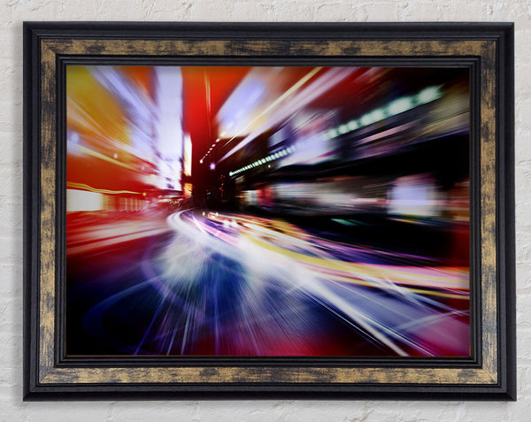 City in a blur colourful light Framed Print