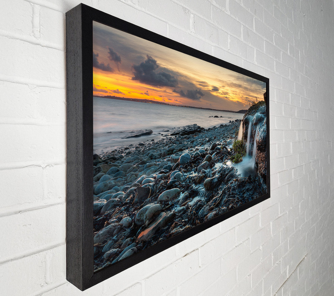  A Canvas Print of Water flows down the rocks into the sea Canvas Wall Art