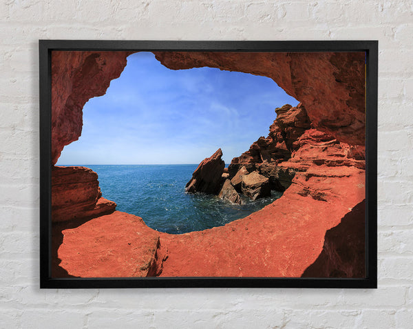 Sea from the view of a cave Framed Print