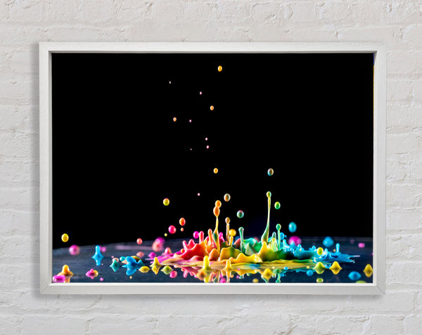 Colour splashes on a surface Framed Print