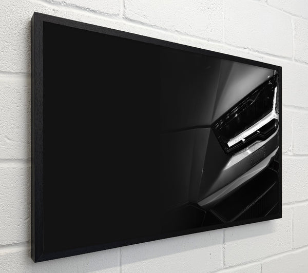 close of headlight on sports car