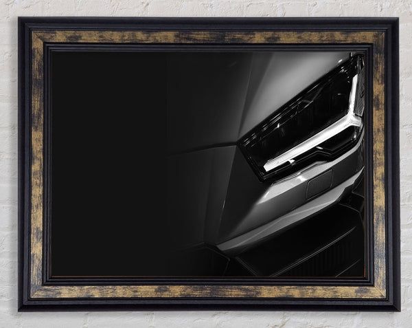 close of headlight on sports car Framed Print
