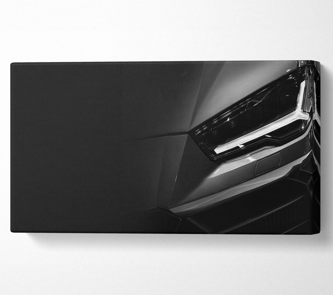  A Canvas Print of close of headlight on sports car Canvas Art