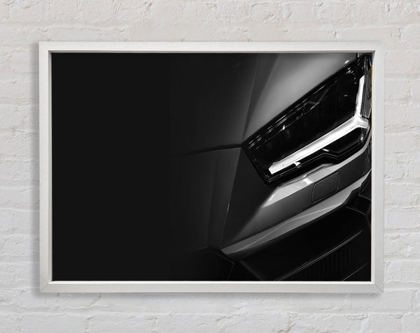 close of headlight on sports car Framed Print