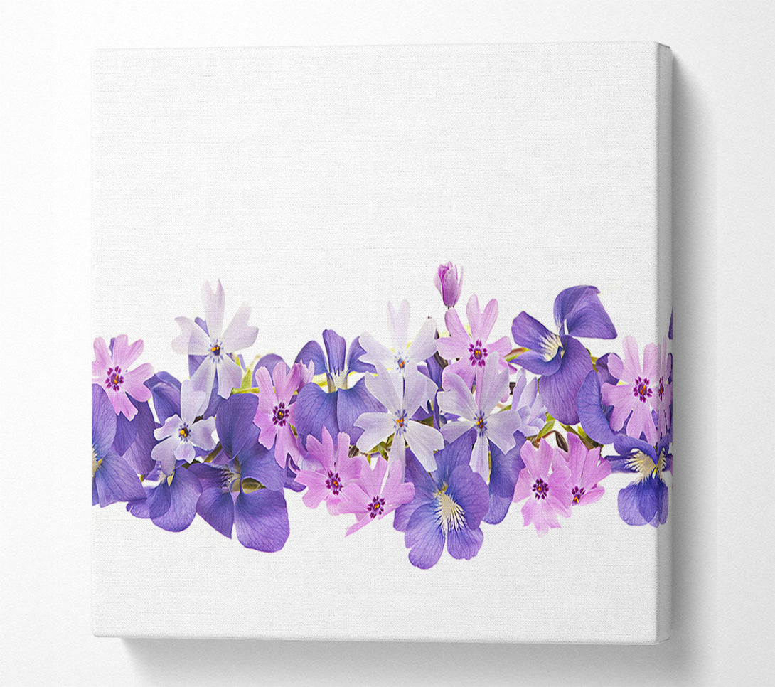  A Canvas Print of Pink and violet flowers laid out Canvas Art
