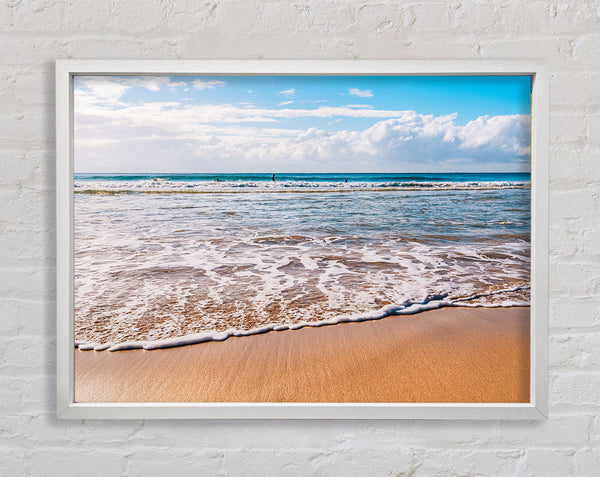 Beautiful sandy day at the beach Framed Print