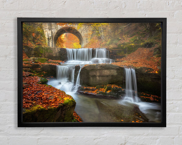 Waterfall under the bridge Framed Print